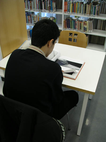 Cutting photo from library book